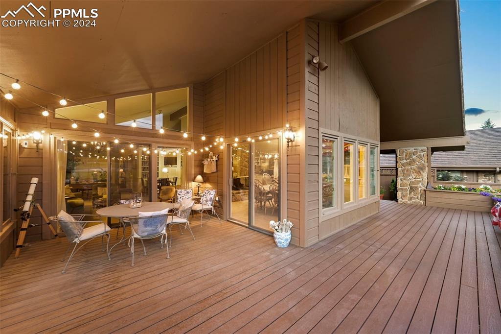 3130 Camels Ridge Lane Colorado Springs, CO 80904 - Photo 33 of 35 a outdoor space with lots of furniture and wooden floor