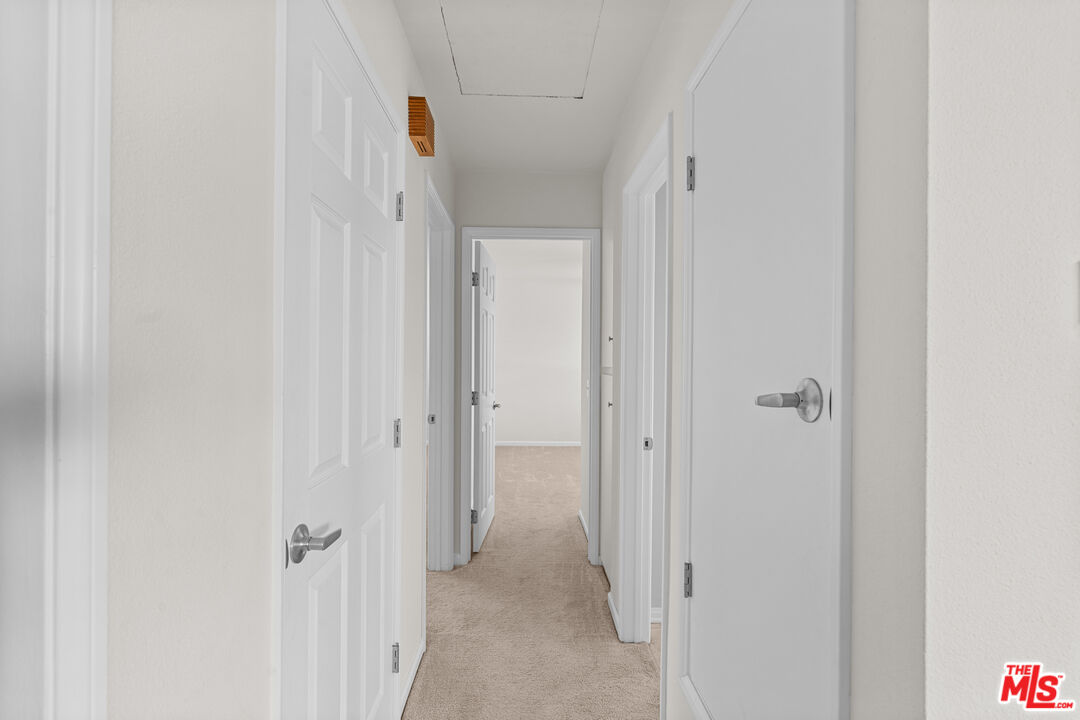 186 Southampton Way, Unit 29 Placentia, CA 92870 - Photo 8 of 20 a view of a hallway with a shower