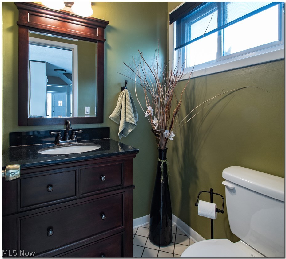 6546 Hansford Road Cleveland, OH 44124 - Photo 14 of 29 Half bath was remodeled with new toilet, vanity and light/mirror.