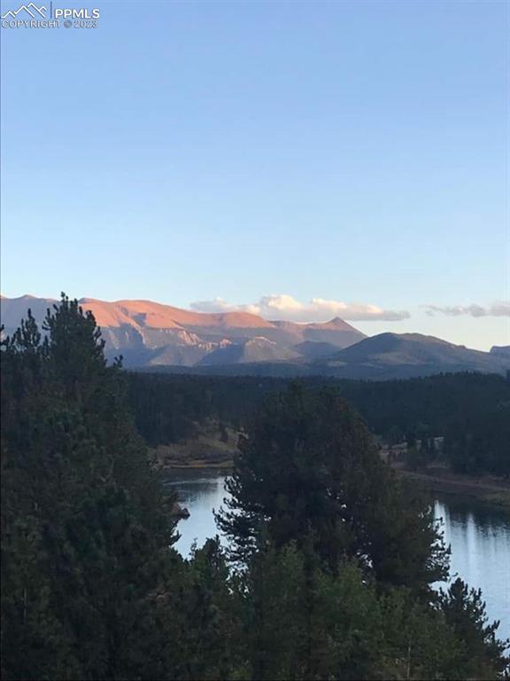 238 Aspen Circle Divide, CO 80814 - Photo 15 of 42 a view of mountain with sunset in background