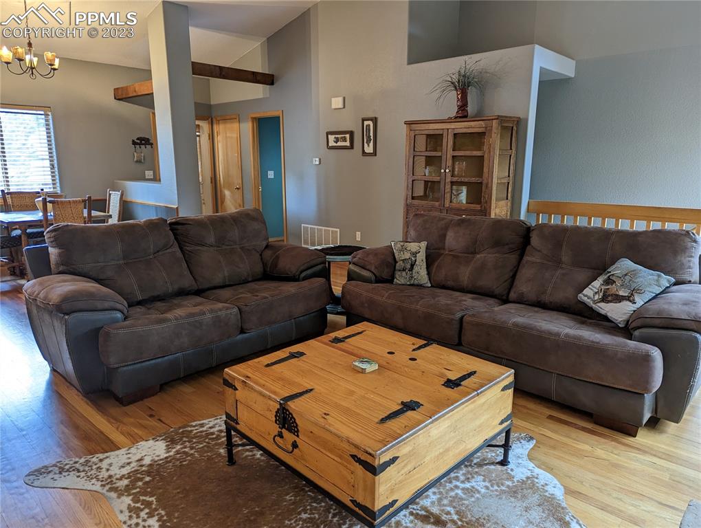 238 Aspen Circle Divide, CO 80814 - Photo 17 of 42 a living room with furniture rug and window
