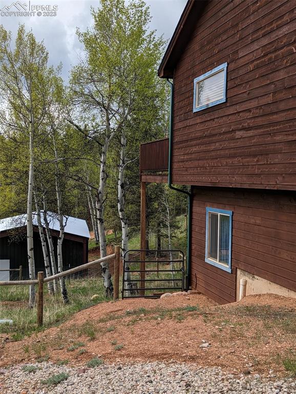 238 Aspen Circle Divide, CO 80814 - Photo 5 of 42 a view of a house with a yard