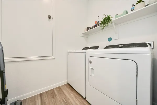 a utility room with dryer and washer