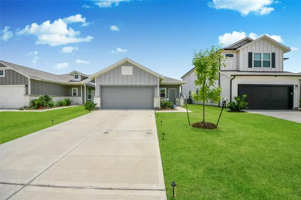 a house view with a garden space