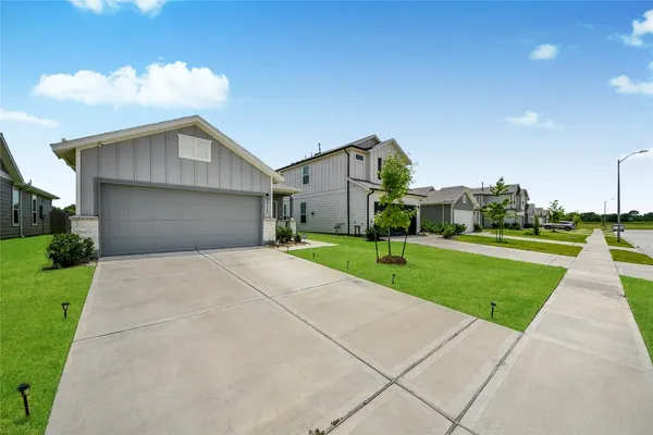 a house view with a garden space