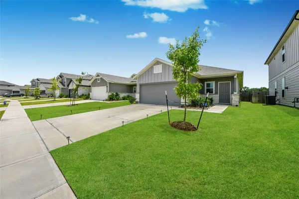 a house view with a garden space