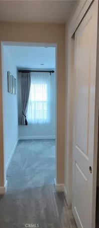 a bathroom with a sink a toilet a shower and a mirror