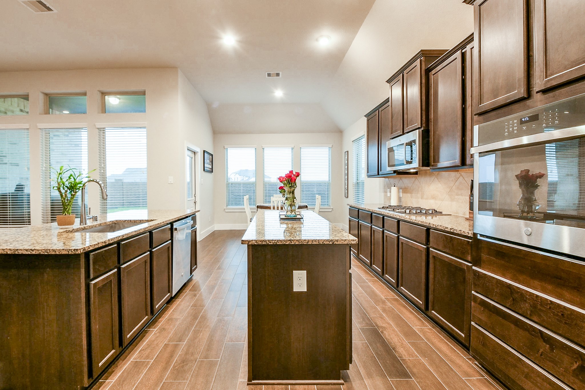236 Bright Bluff Circle Waller, TX 77484 - Photo 14 of 32 a kitchen with counter top space and stainless steel appliances