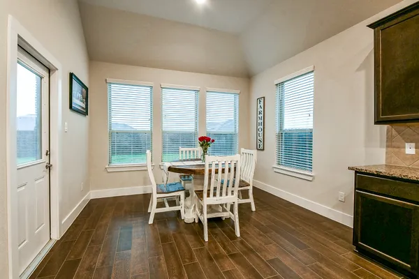 a bedroom with a bed and furniture