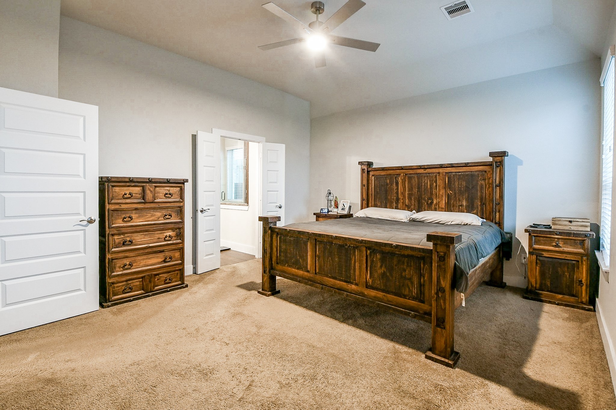 236 Bright Bluff Circle Waller, TX 77484 - Photo 17 of 32 a bedroom with a bed and furniture