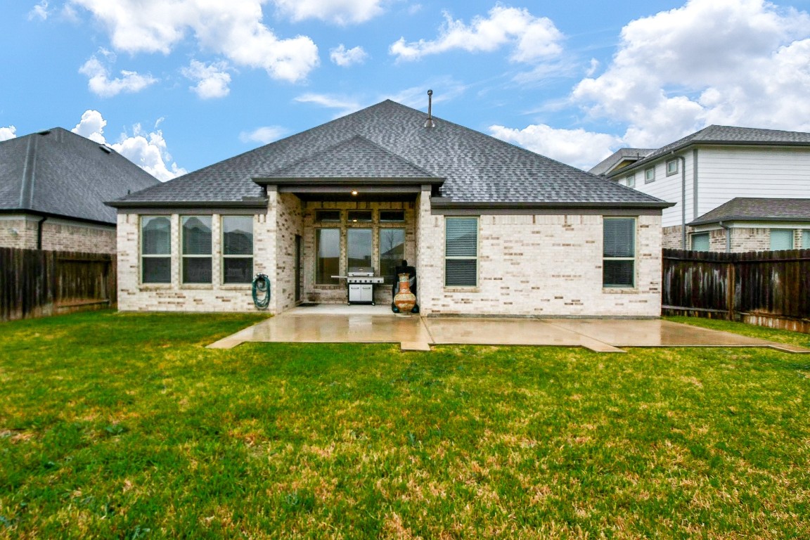 236 Bright Bluff Circle Waller, TX 77484 - Photo 32 of 32 a view of a house with a yard