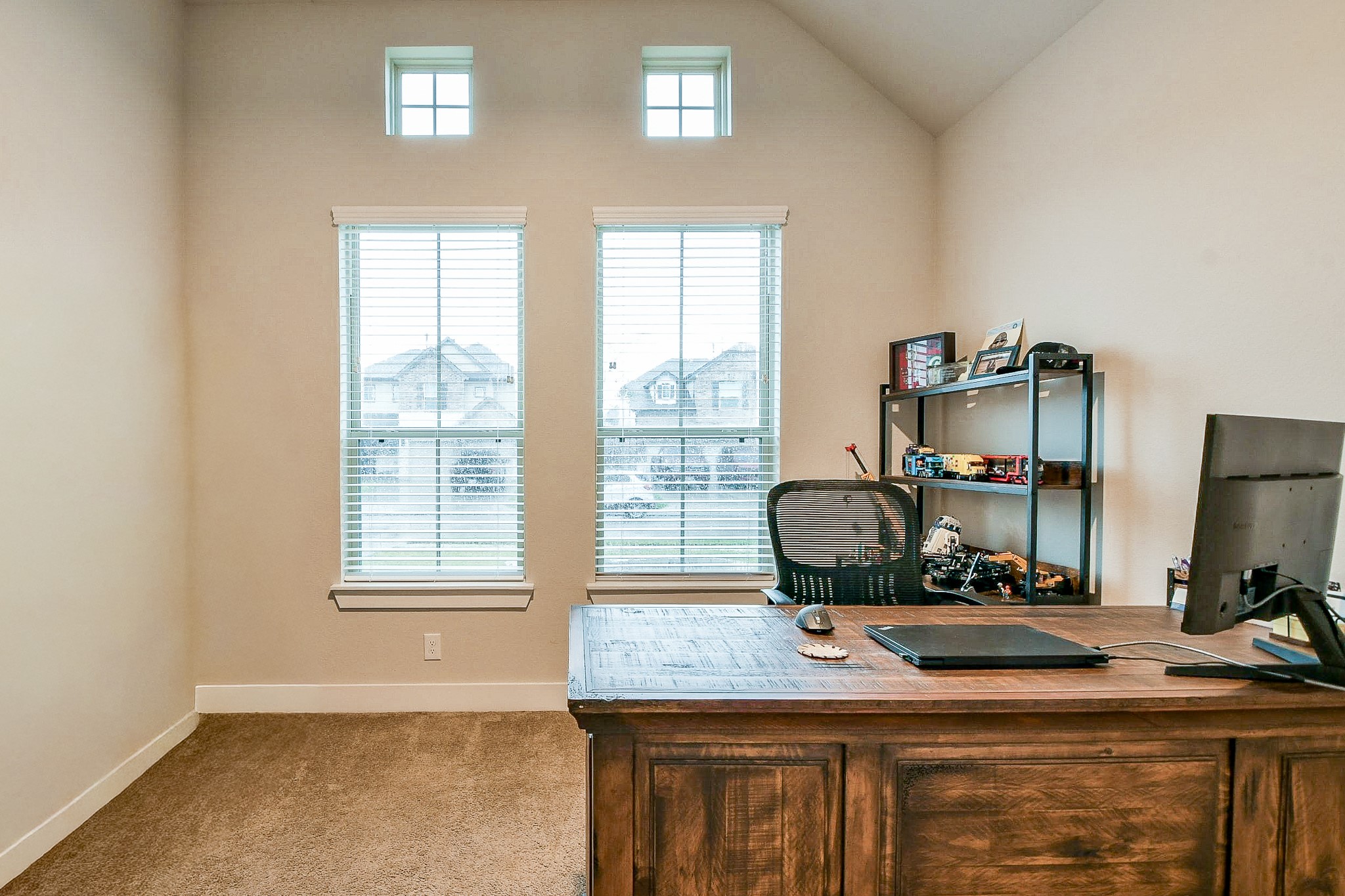 236 Bright Bluff Circle Waller, TX 77484 - Photo 5 of 32 a room with a window and gym equipment