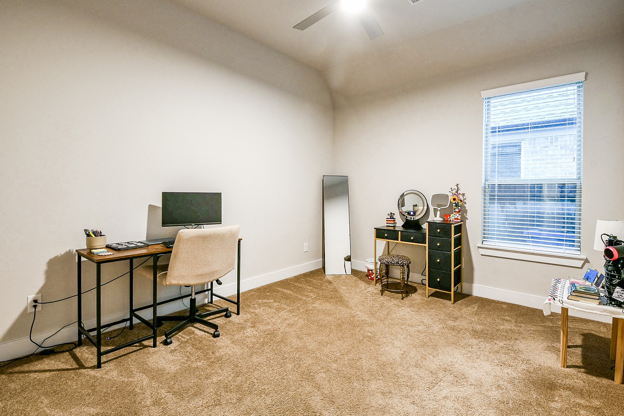 236 Bright Bluff Circle Waller, TX 77484 - Photo 6 of 32 a view of a workspace with furniture and a window