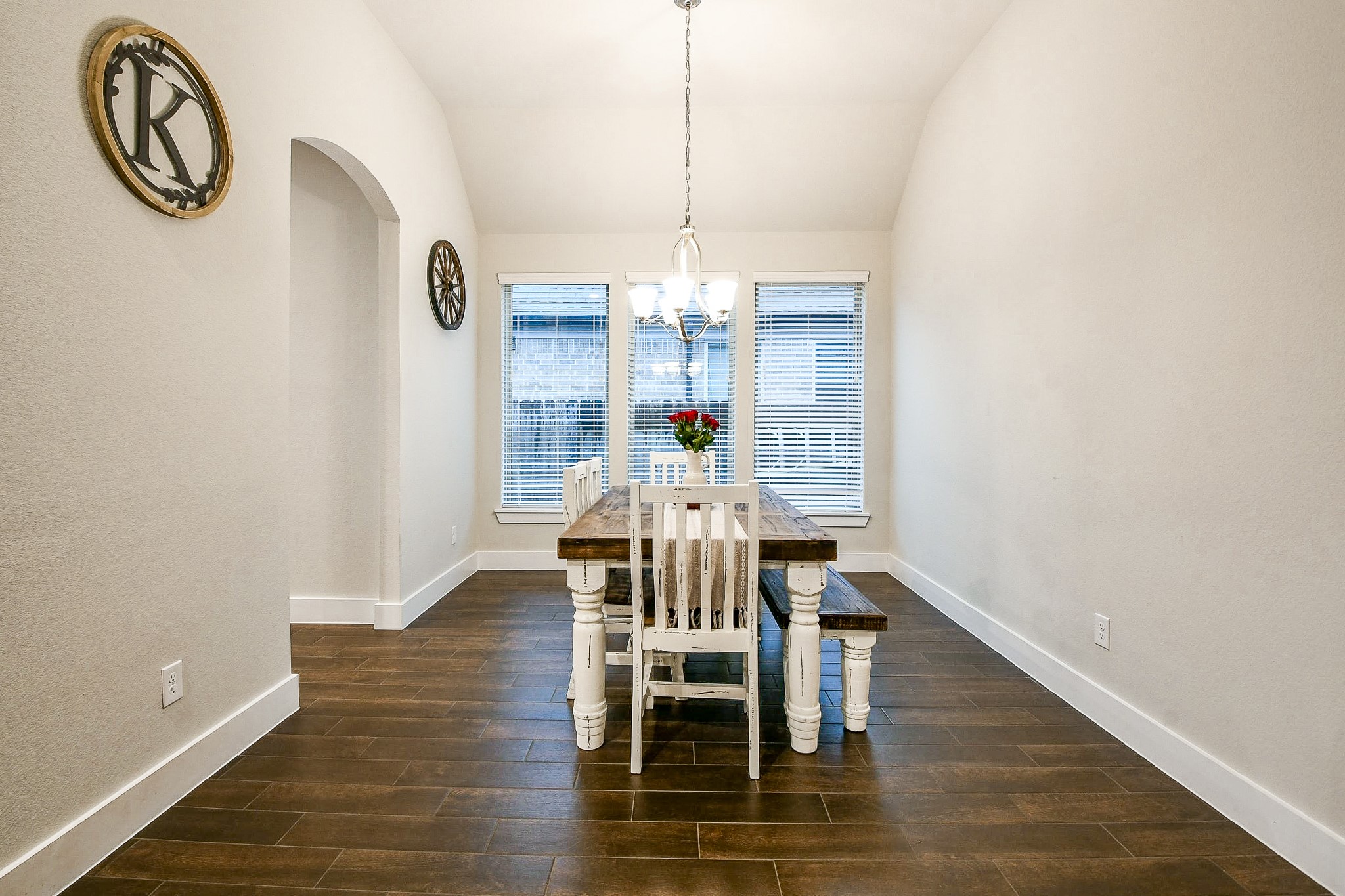 236 Bright Bluff Circle Waller, TX 77484 - Photo 7 of 32 a view of a dining room with furniture window and wooden floor
