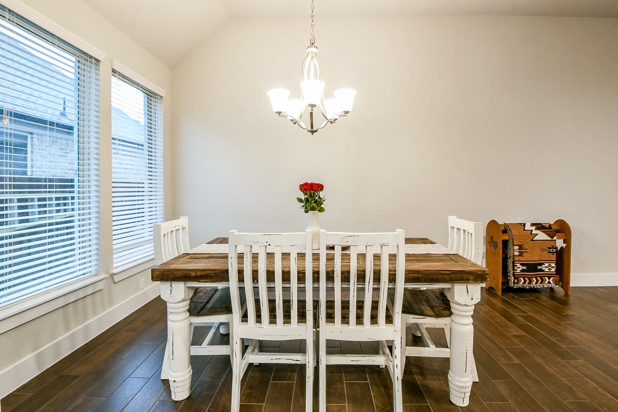 236 Bright Bluff Circle Waller, TX 77484 - Photo 8 of 32 a view of a dining room with furniture wooden floor and chandelier