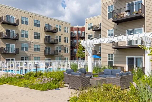 a view of pool with outdoor seating