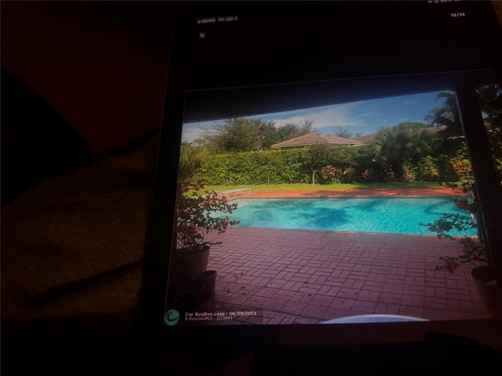 20952 Delagado Terrace Boca Raton, FL 33433 - Photo 17 of 18 a view of a yard