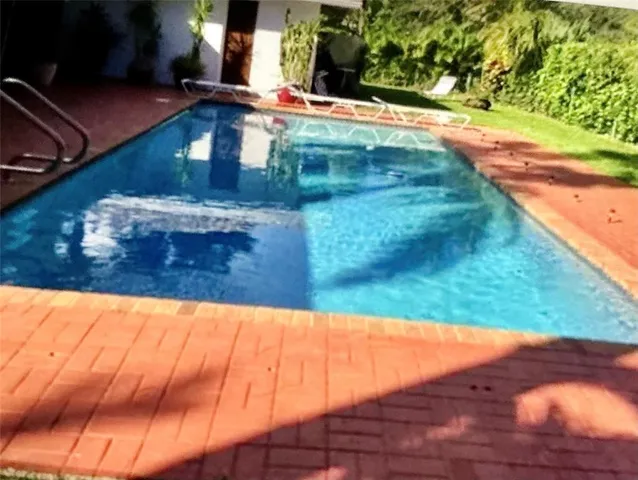 a view of a yard with an outdoor space