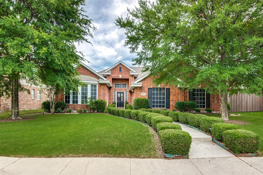 9364 Windmill Point Frisco, TX 75033 - Photo 1 of 1 a front view of a house with a yard