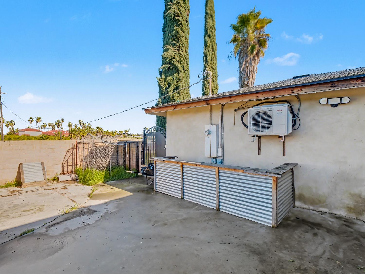 16998 Rio Plaza Road Madera, CA 93636 - Photo 36 of 42 a view of a patio with a yard