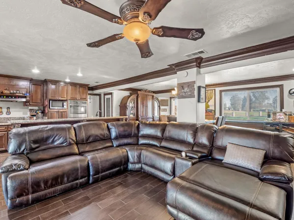a living room with furniture and a window