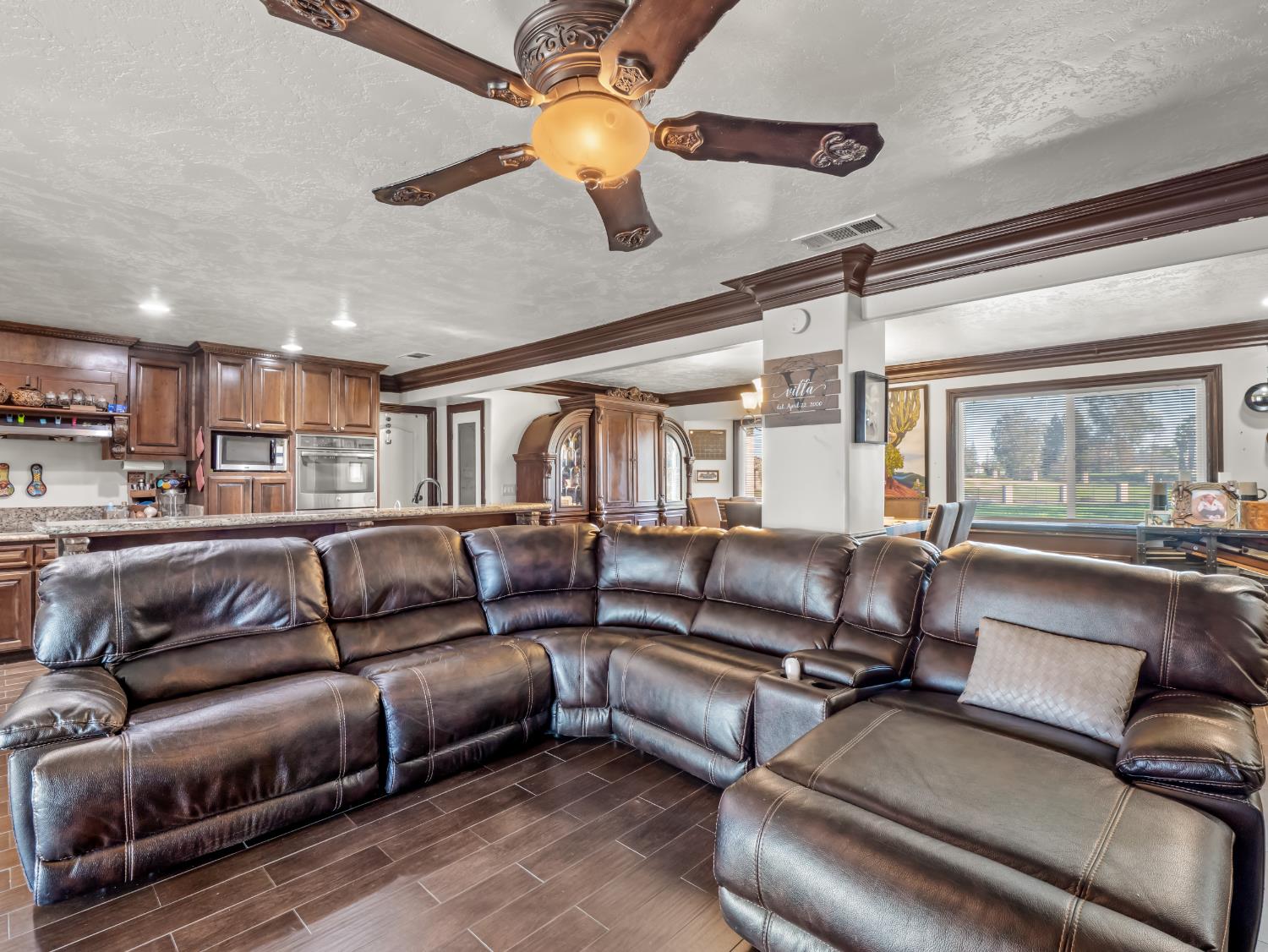 16998 Rio Plaza Road Madera, CA 93636 - Photo 5 of 42 a living room with furniture and a window