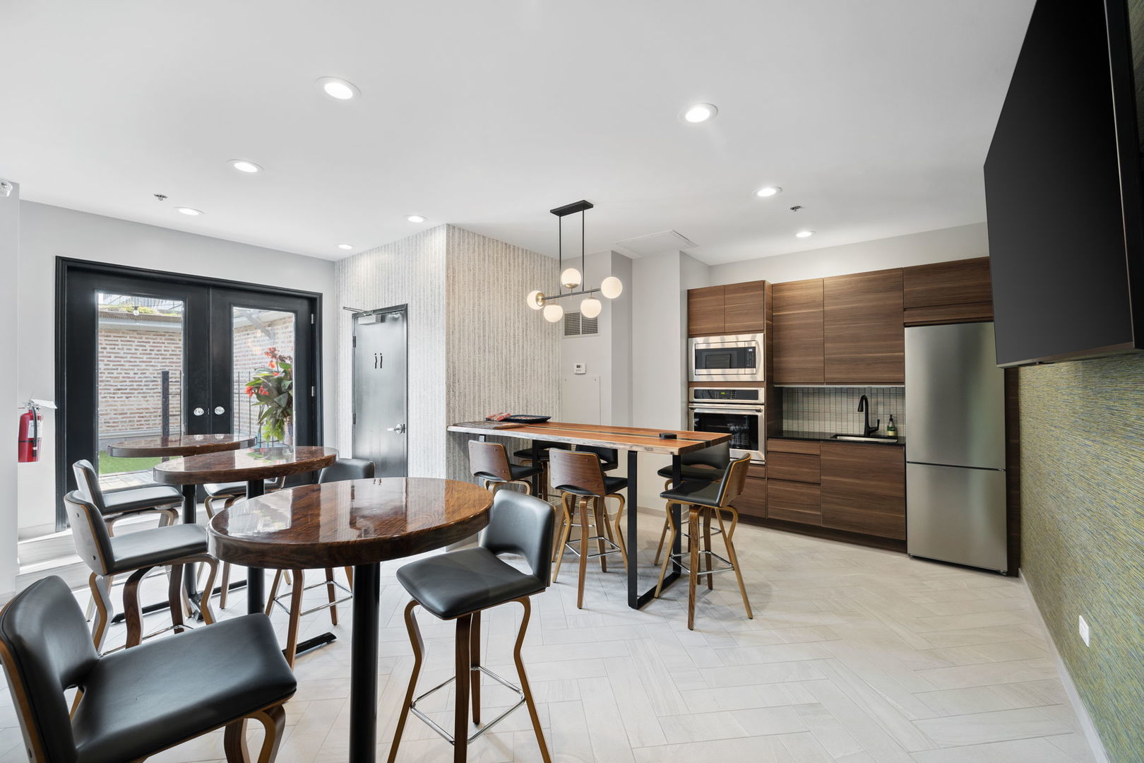 8 West Monroe Street, Unit 1410 Chicago, IL 60603 - Photo 14 of 16 a view of a dining room with furniture