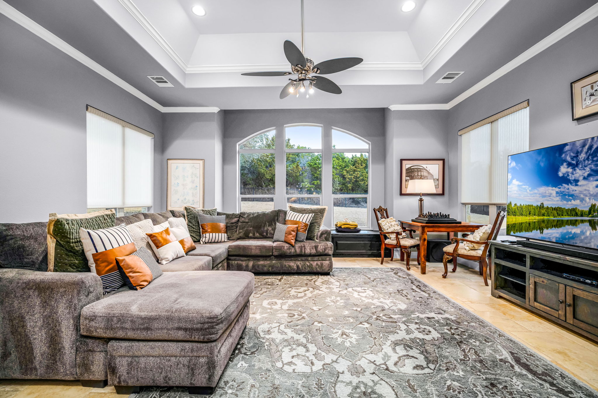 11604 Shoreview Overlook Austin, TX 78732 - Photo 30 of 40 Living room with crown molding and ceiling fan