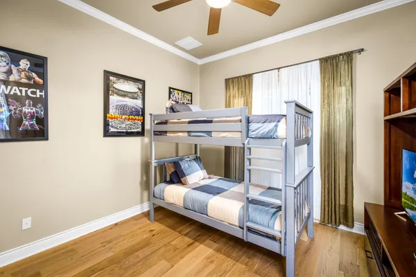 a bedroom with furniture and a window