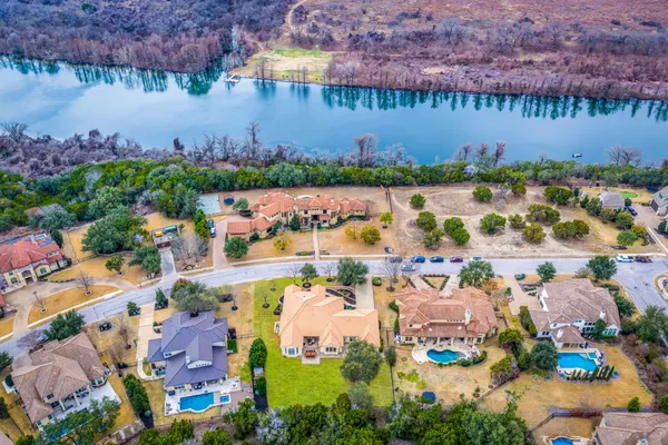 an aerial view of a houses with outdoor space