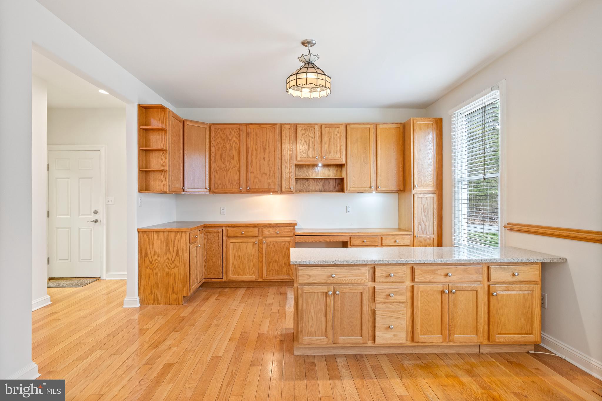 322 Piney Point Road Pasadena, MD 21122 - Photo 16 of 50 a kitchen with a sink cabinets and window