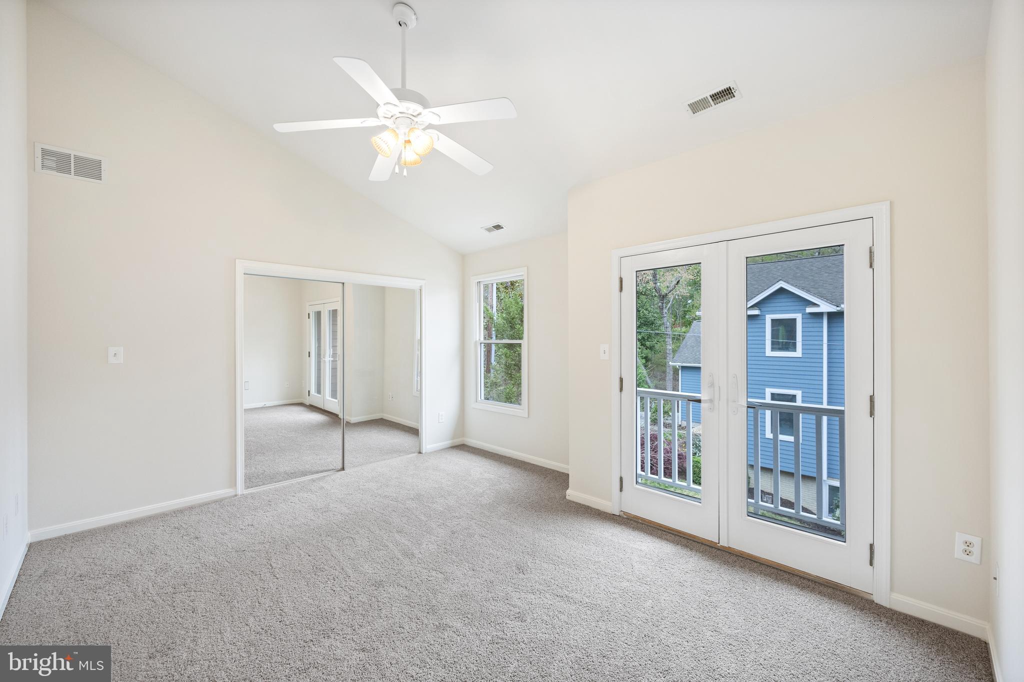 322 Piney Point Road Pasadena, MD 21122 - Photo 20 of 50 a view of an empty room with chandelier fan