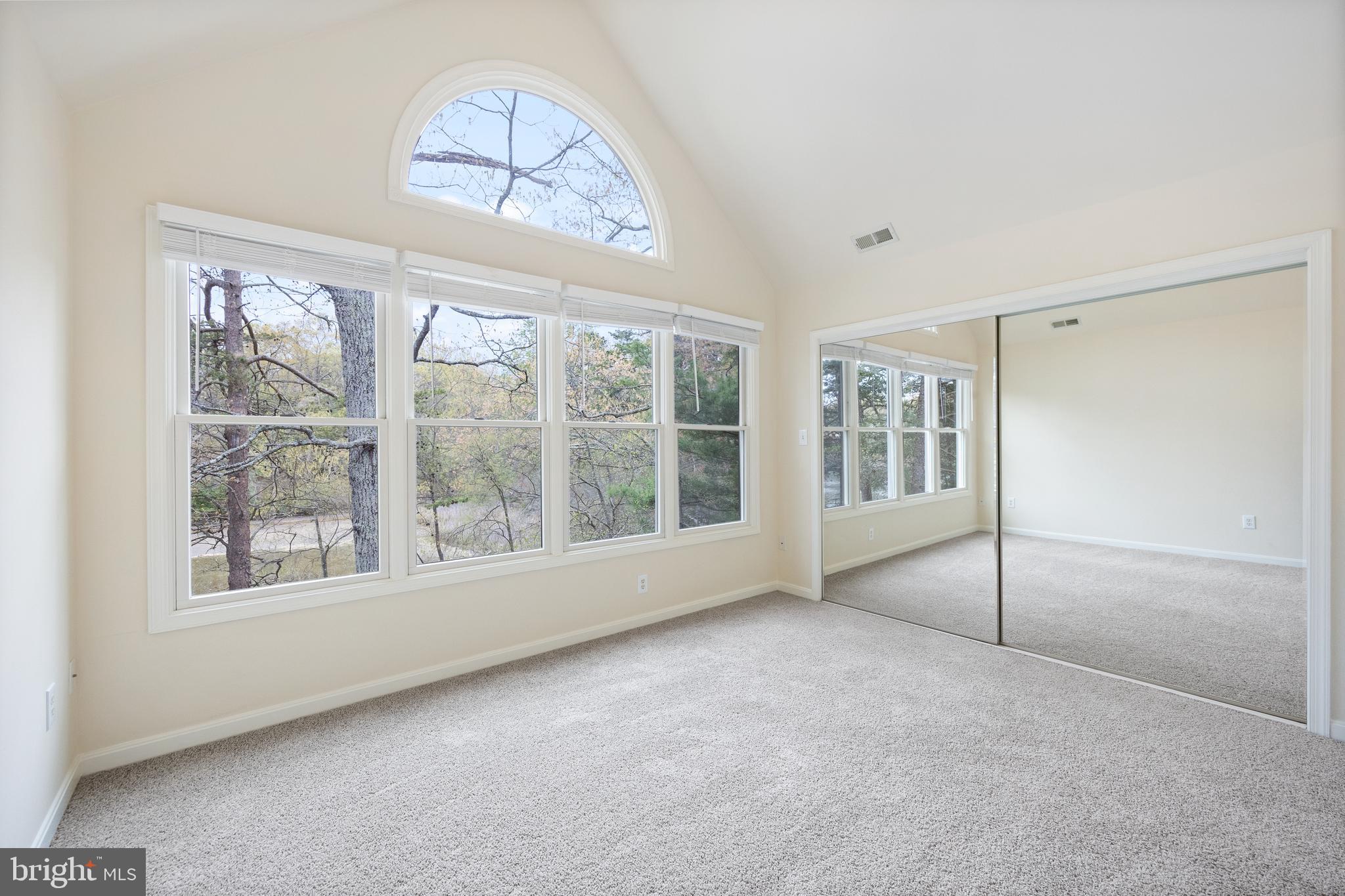 322 Piney Point Road Pasadena, MD 21122 - Photo 21 of 50 a view of an empty room with a window