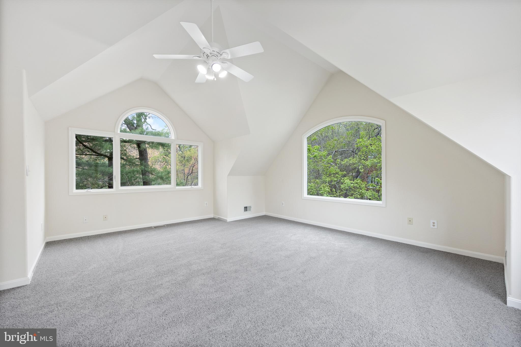 322 Piney Point Road Pasadena, MD 21122 - Photo 25 of 50 an empty room with windows and an entrance