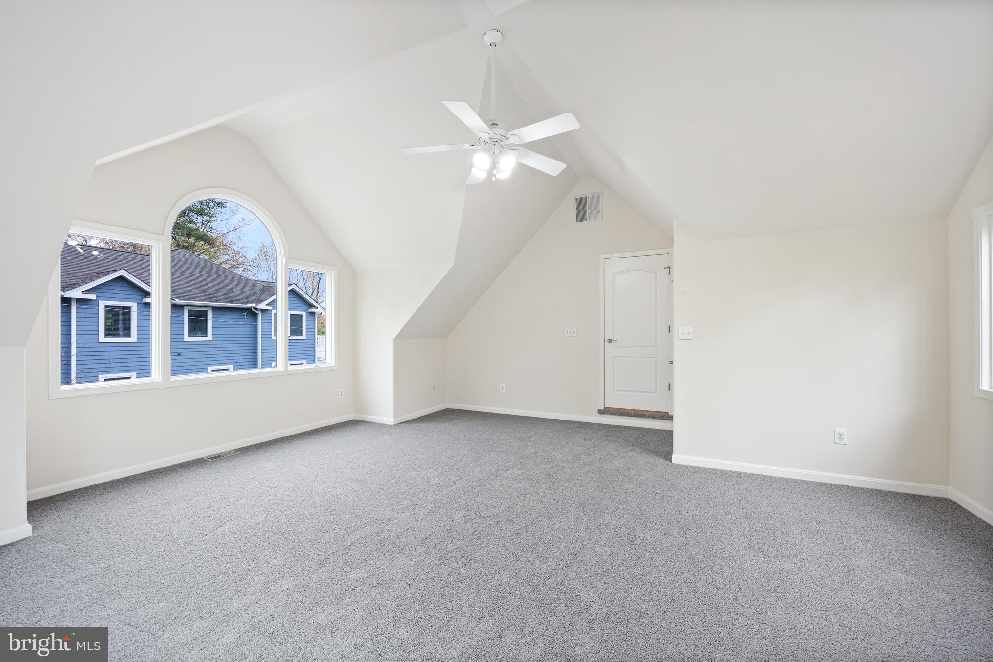 322 Piney Point Road Pasadena, MD 21122 - Photo 26 of 50 a view of an empty room with a window