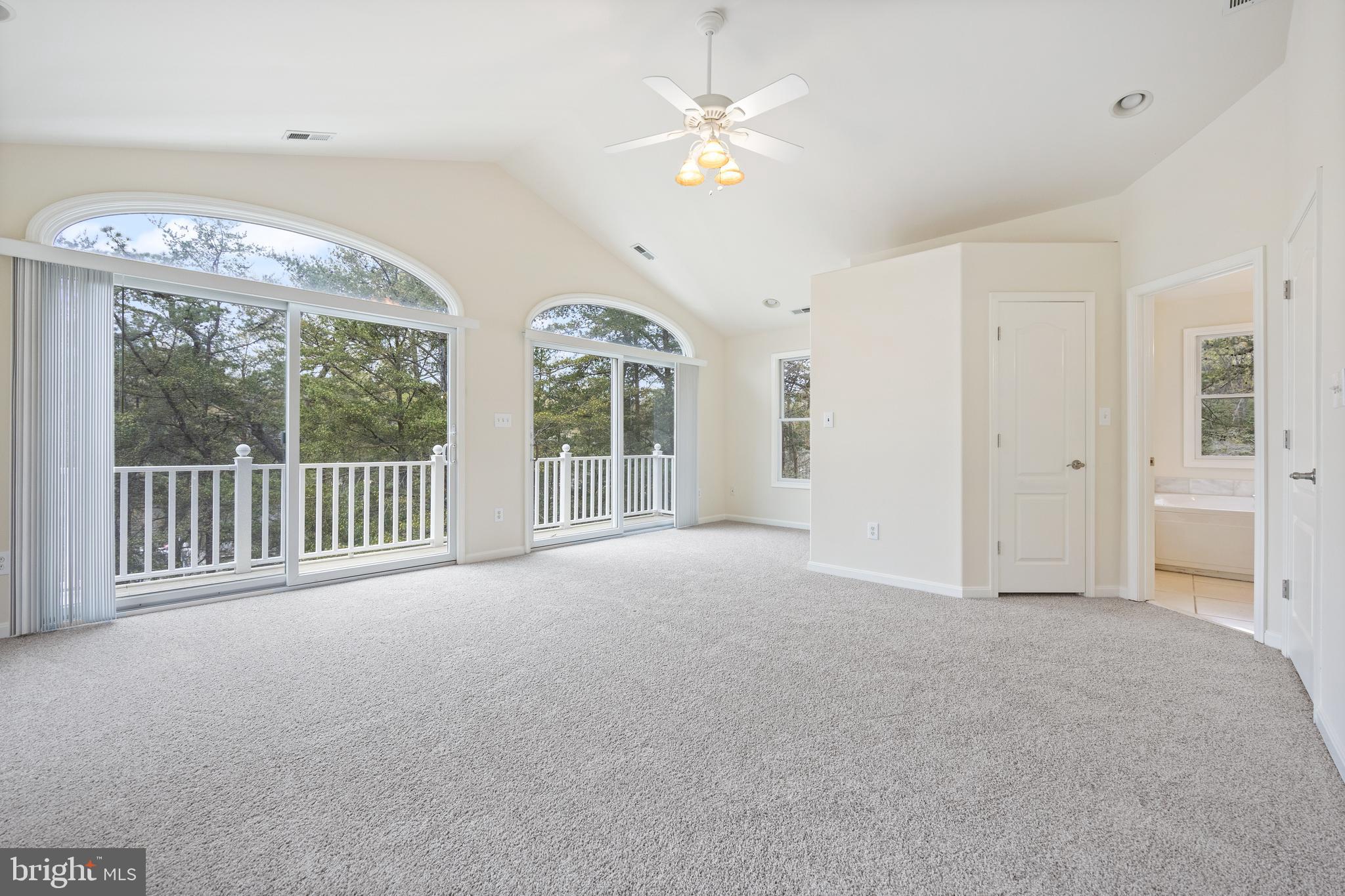 322 Piney Point Road Pasadena, MD 21122 - Photo 28 of 50 an empty room with windows and outdoor view