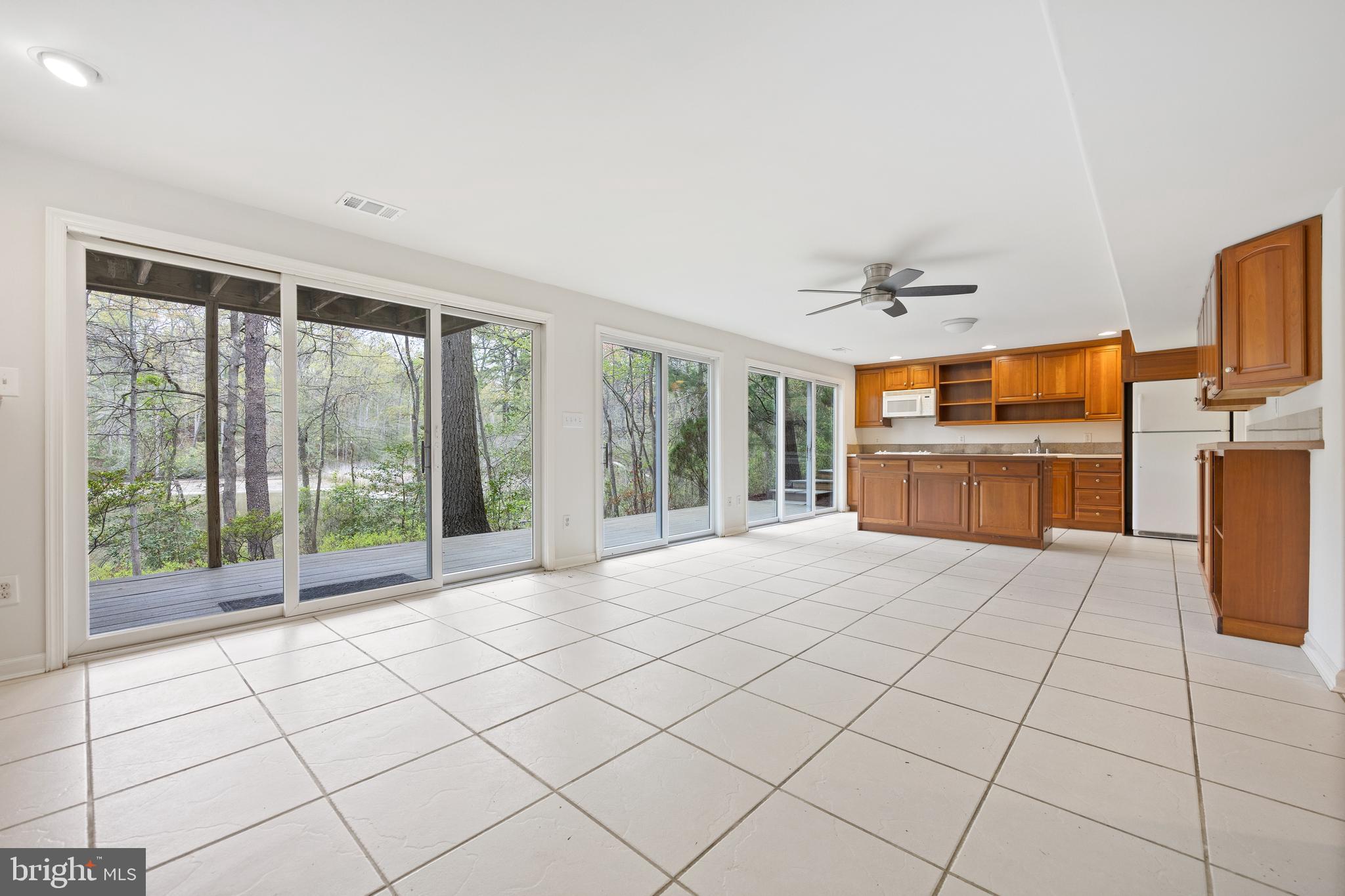 322 Piney Point Road Pasadena, MD 21122 - Photo 32 of 50 a large white room with windows