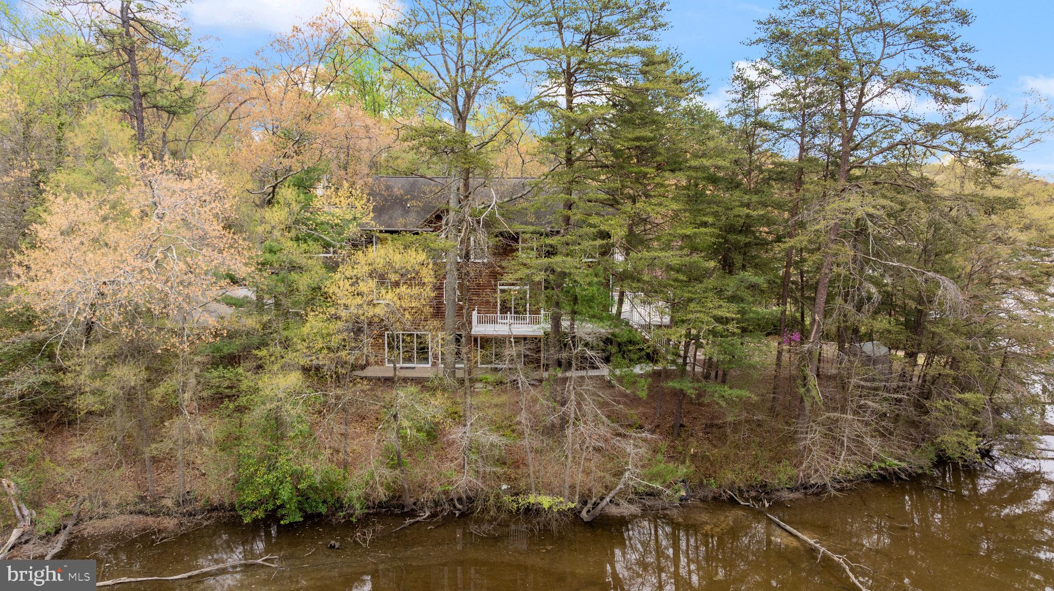322 Piney Point Road Pasadena, MD 21122 - Photo 47 of 50 a view of a lake with a mountain