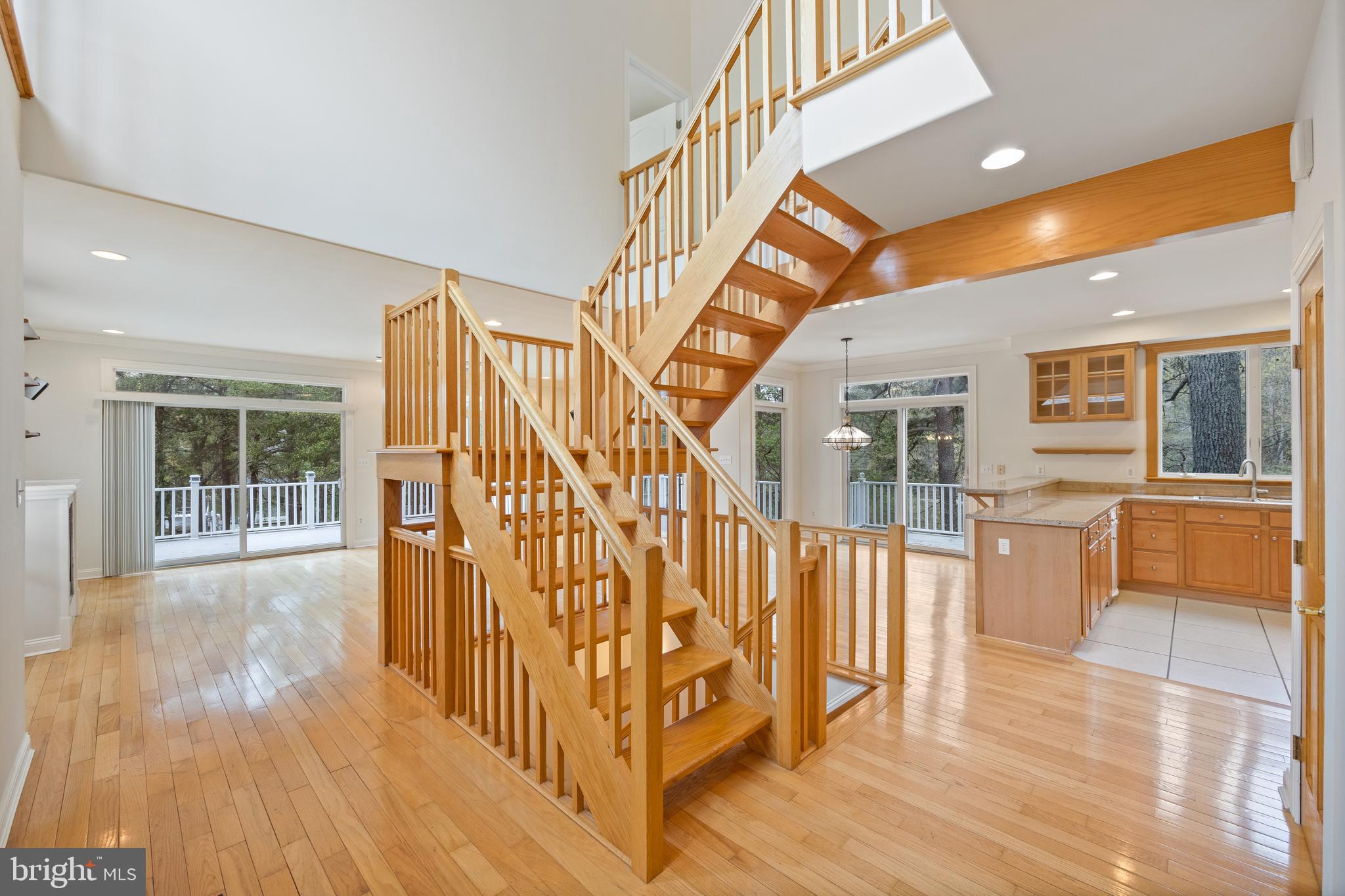 322 Piney Point Road Pasadena, MD 21122 - Photo 10 of 50 a view of entryway and hall with wooden floor