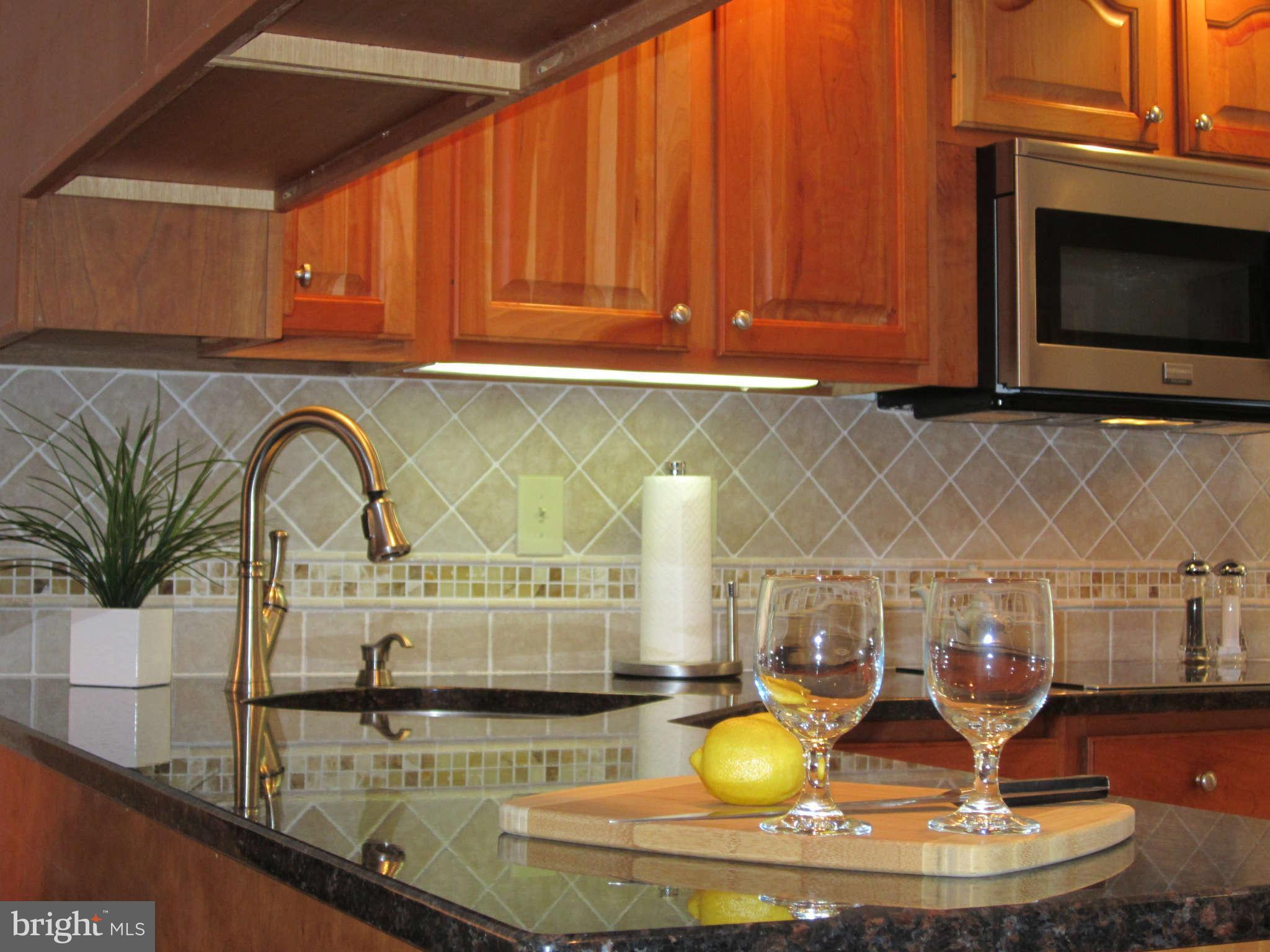 1113 Peachtree Road Fallston, MD 21047 - Photo 14 of 30 a kitchen with a sink and a microwave