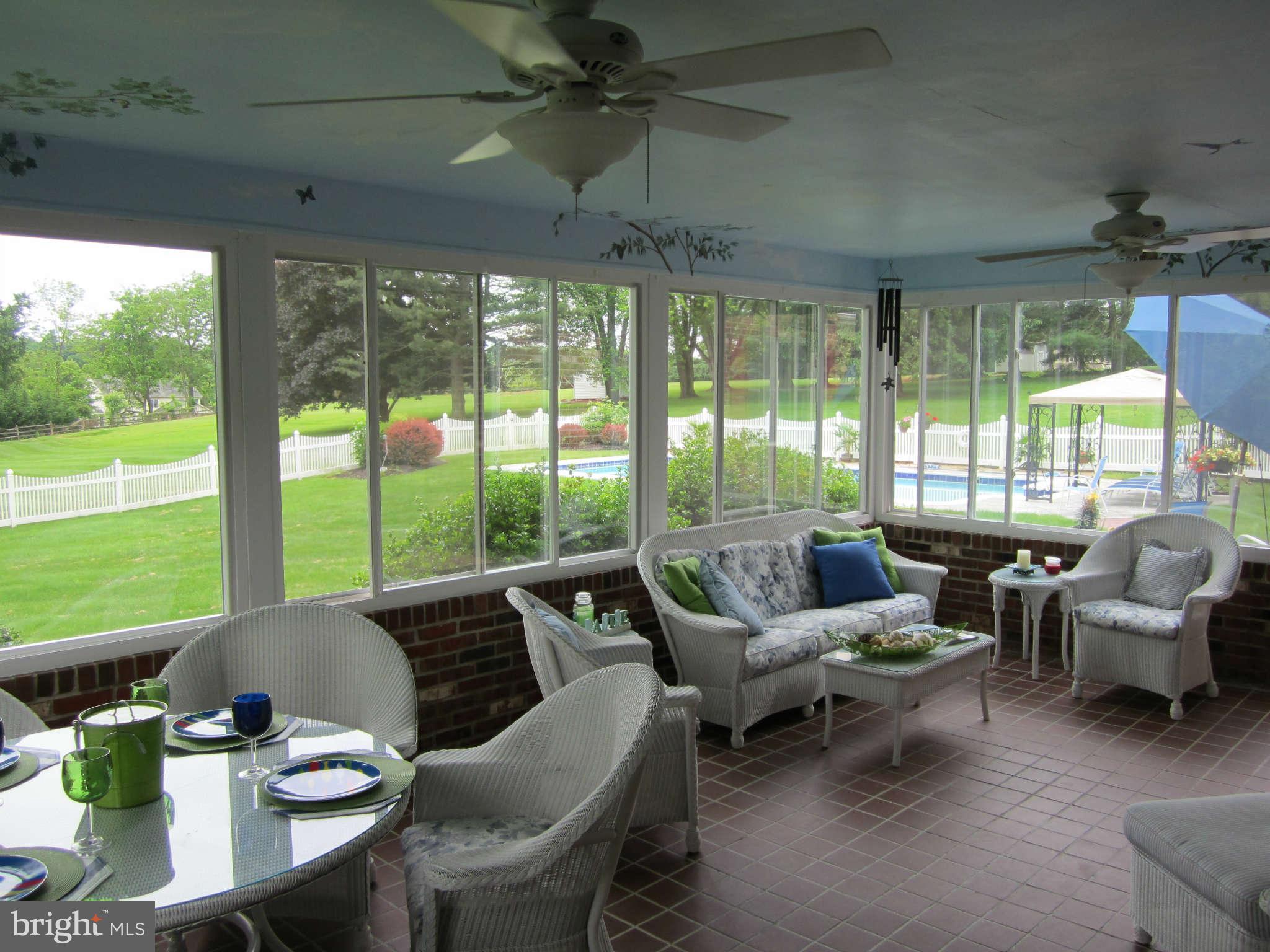 1113 Peachtree Road Fallston, MD 21047 - Photo 16 of 30 a living room with furniture and a floor to ceiling window