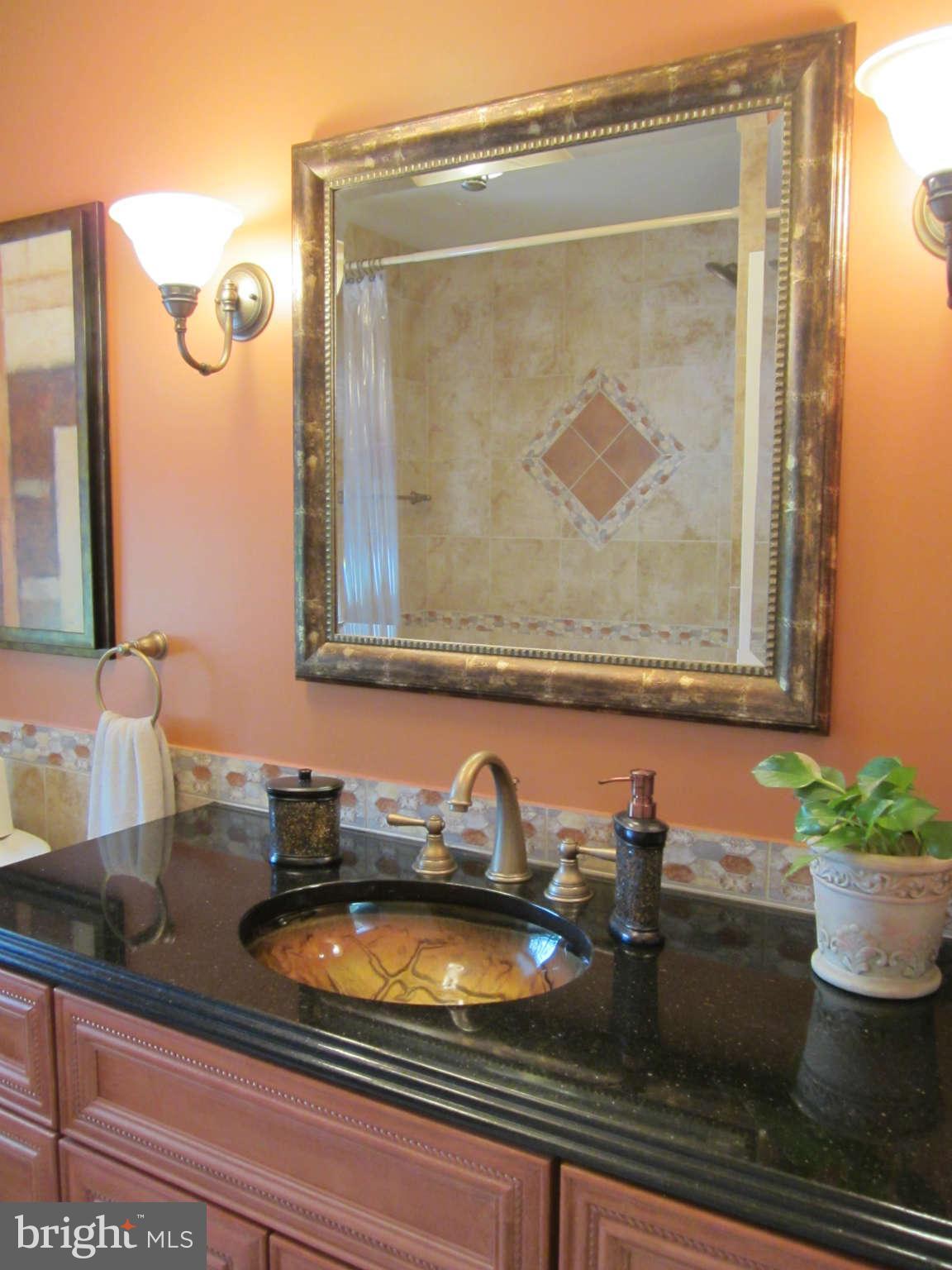 1113 Peachtree Road Fallston, MD 21047 - Photo 18 of 30 a bathroom with a sink and mirror