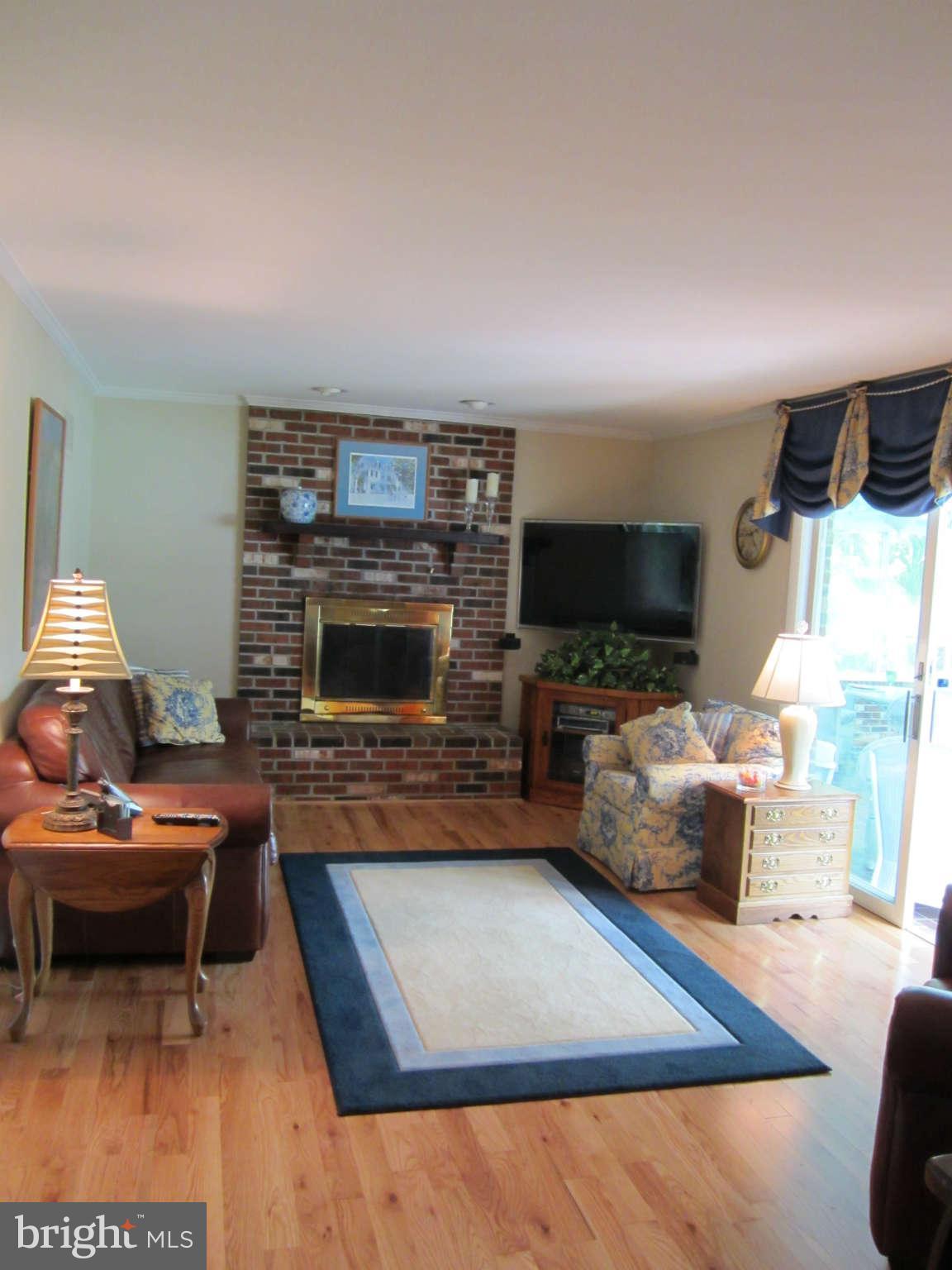 1113 Peachtree Road Fallston, MD 21047 - Photo 26 of 30 a living room with furniture and a flat screen tv