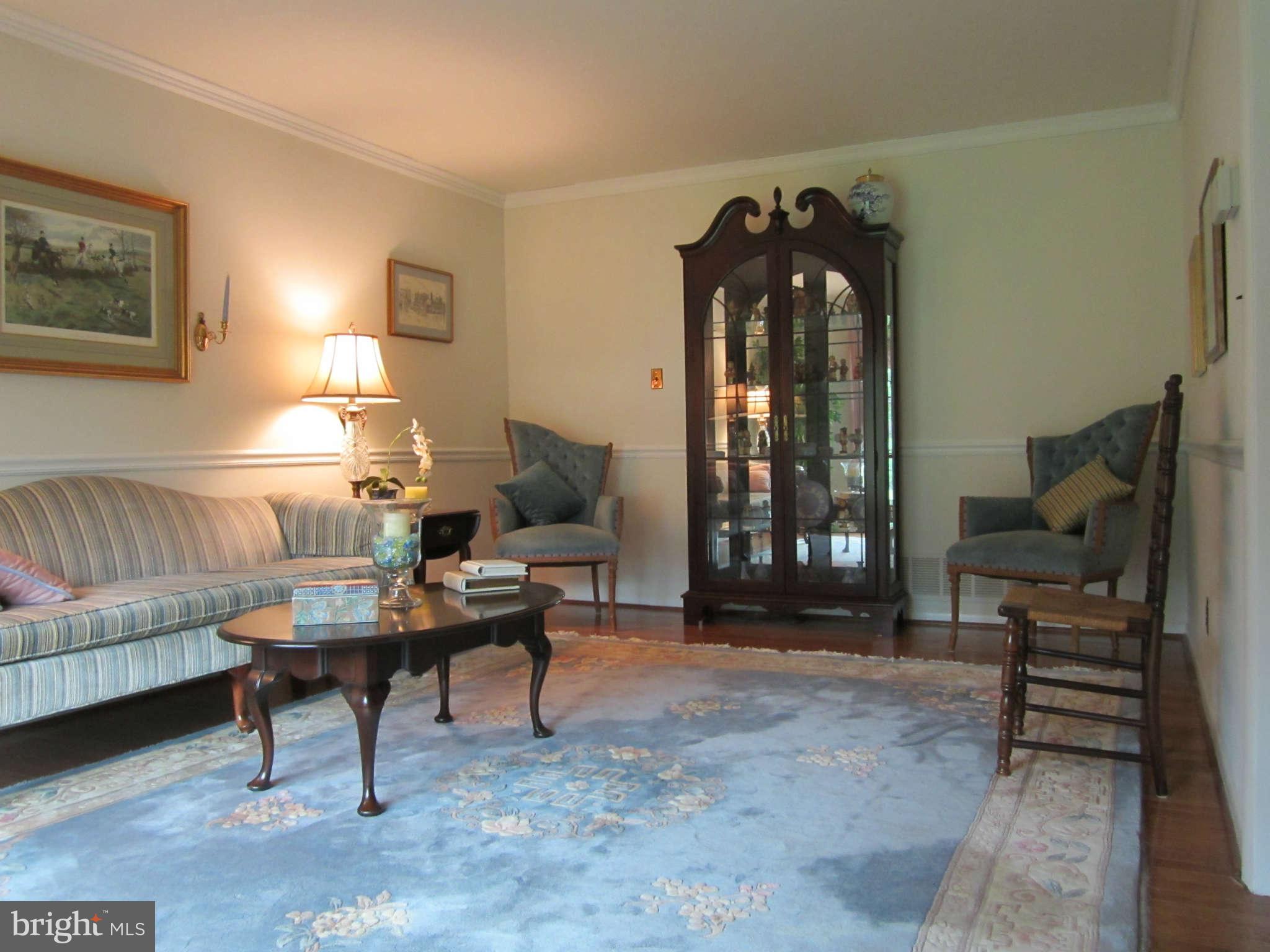 1113 Peachtree Road Fallston, MD 21047 - Photo 5 of 30 a living room with furniture and a fireplace