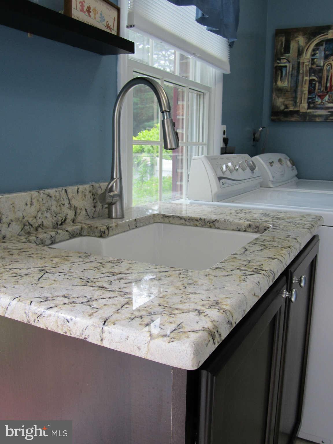 1113 Peachtree Road Fallston, MD 21047 - Photo 9 of 30 a sink with a granite counter top and a window