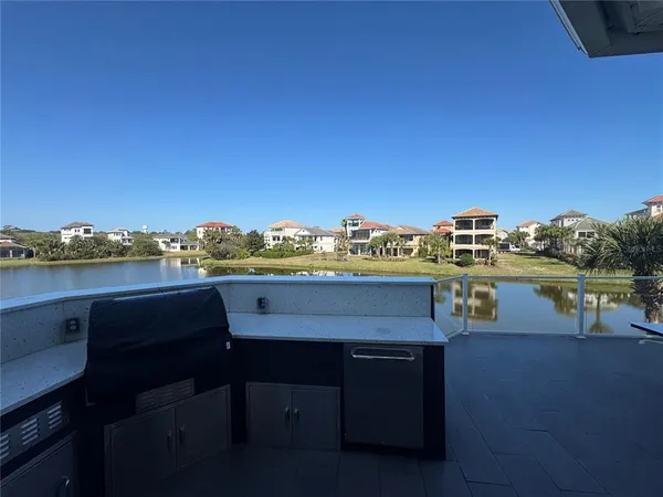 a view of a lake with a city