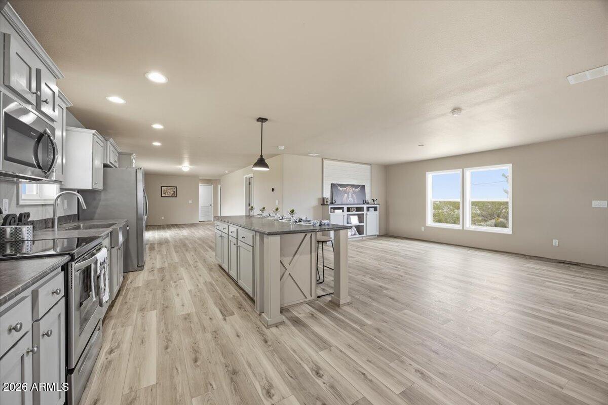 33597 South Davis Ranch Road Marana, AZ 85658 - Photo 11 of 48 a view of kitchen with sink microwave and stove