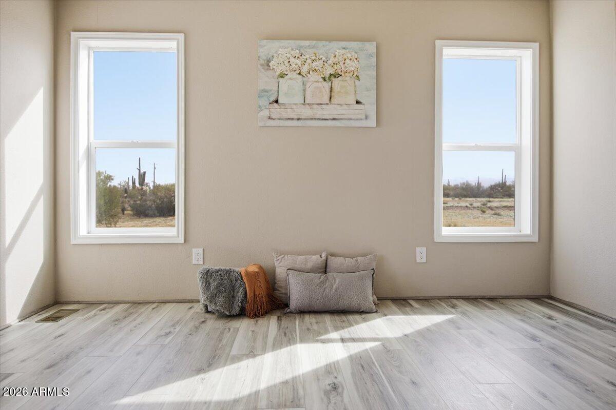 33597 South Davis Ranch Road Marana, AZ 85658 - Photo 16 of 48 a bedroom with a bed and a window
