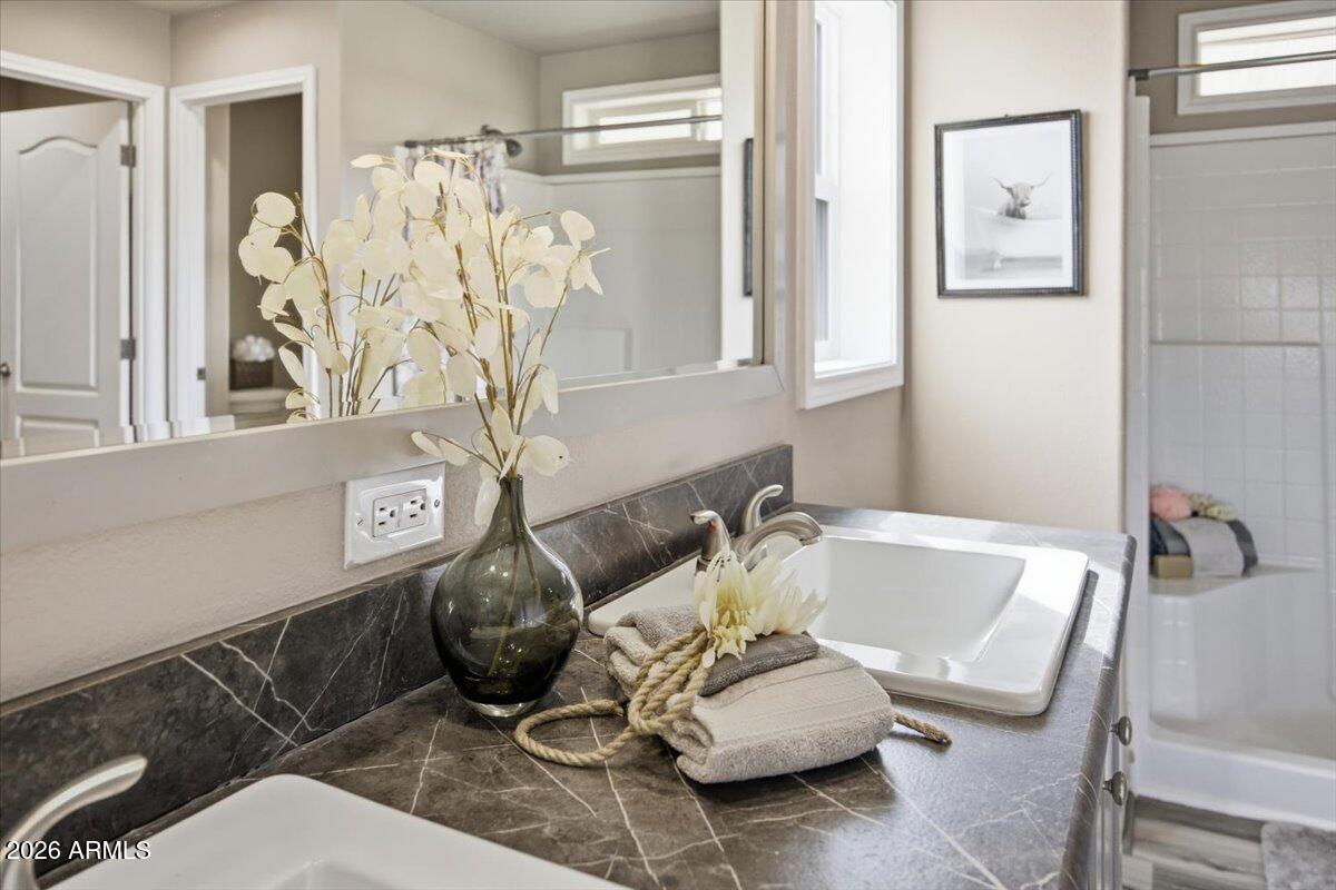 33597 South Davis Ranch Road Marana, AZ 85658 - Photo 20 of 48 a living room with furniture and a chandelier