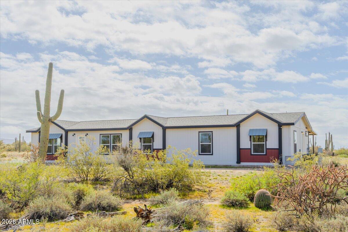 33597 South Davis Ranch Road Marana, AZ 85658 - Photo 2 of 48 a view of a house with backyard and garden